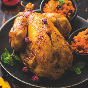 Poulet à l’eau de rose aux lentilles corail et à l’aubergine
